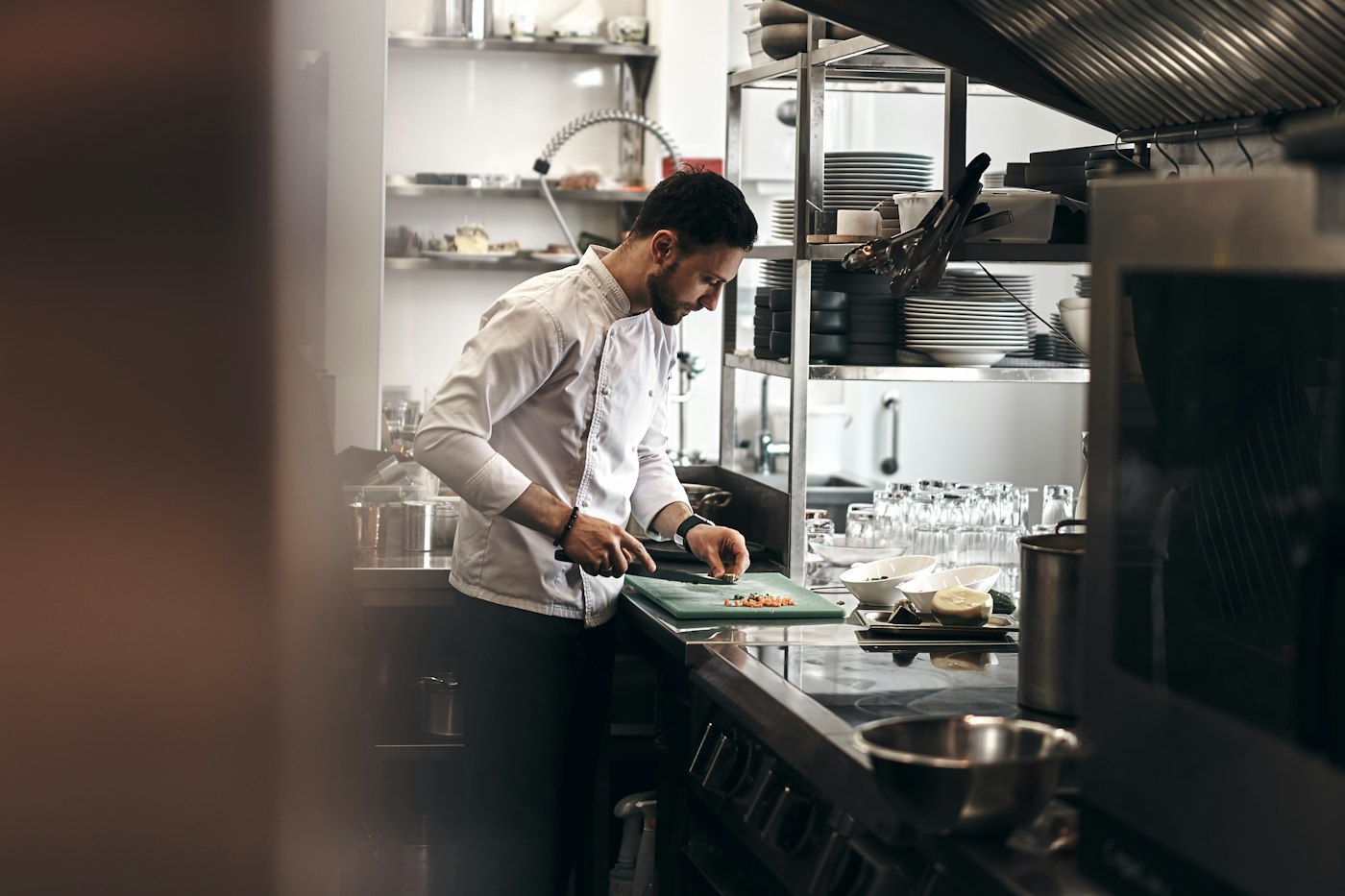 A chef working in a restaurant kitchen